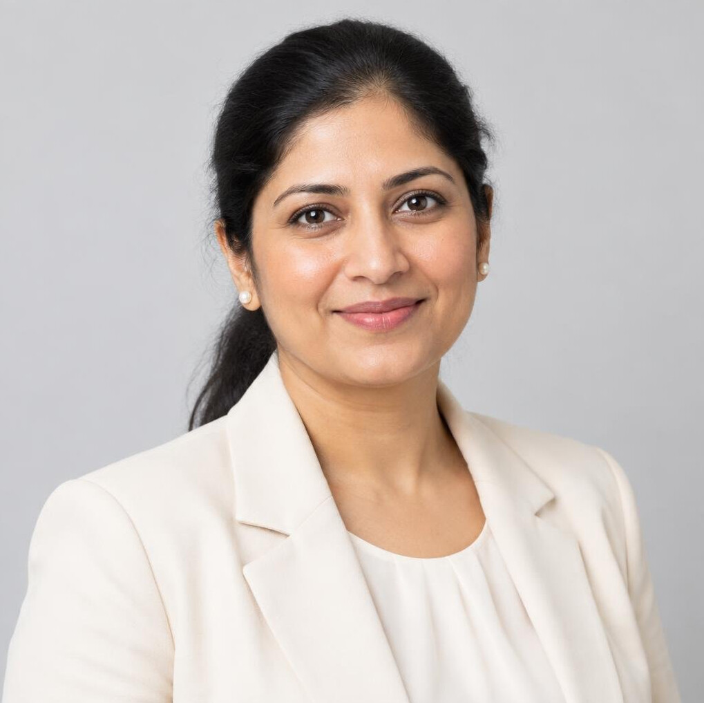Studio portrait of a South Asian woman facilitator in her 30s